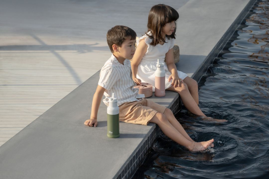 Children by the swimming pool