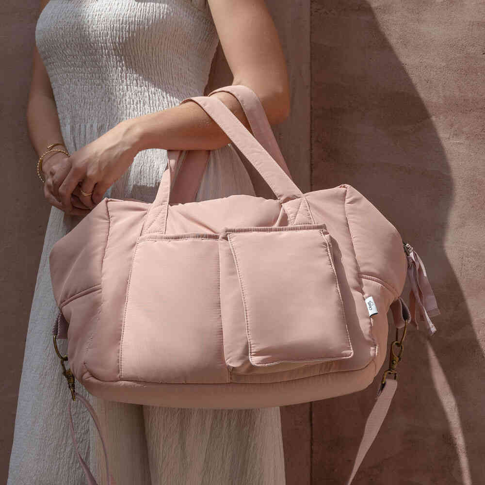 pink maternity bag in hand 2022